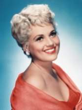 Judy Holliday (1921-65) - She was an actress that didn´t do that unfortunately to us, didn´t do that many movies during her short career. She was only 43 years old when she died of breast cancer. She is known from "Adam´s rib" (1949), "Born Yesterday" (she won an Oscar, 1950), "Full of life" (1956) and "Bells are ringing" (1960). Judy also worked in theatre. She won an Tony Award in 1957 for the musical "Bells are ringing". She would later repeat her role in the movie version (1960). Judy was married once and in 1931 she had a son, Jonathan.
